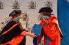 The Chancellor of the University of Nairobi receiving the statutes of the University of Nairobi in preparation  of the installation process