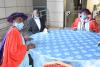 Members of staff waiting for lunch after the Installation of Prof. Kiama